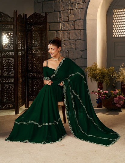 Complete look of the Emerald Green Gold Stonework Designer Saree with matching blouse piece and elegant gold stonework.
