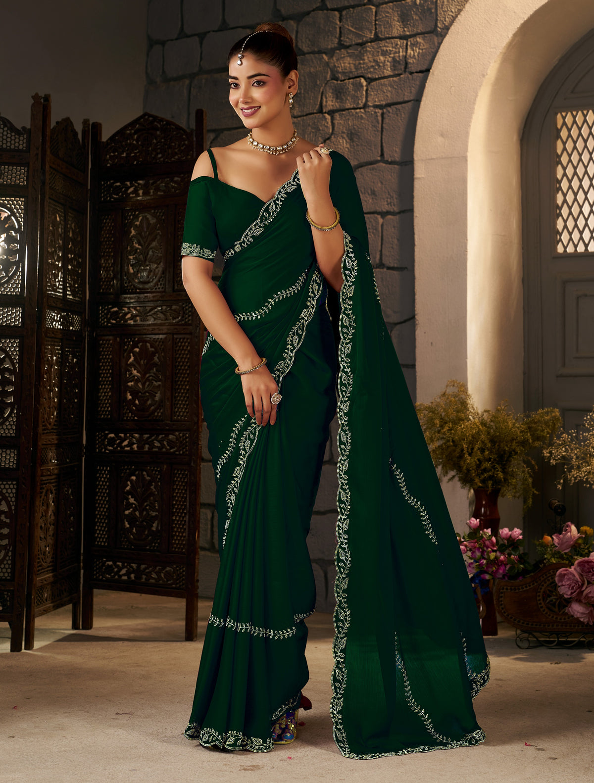 Full-length view of the Emerald Green Gold Stonework Designer Saree with matching blouse piece.