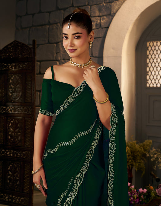 Intricate gold stonework embellishments on the Emerald Green Gold Stonework Designer Saree.