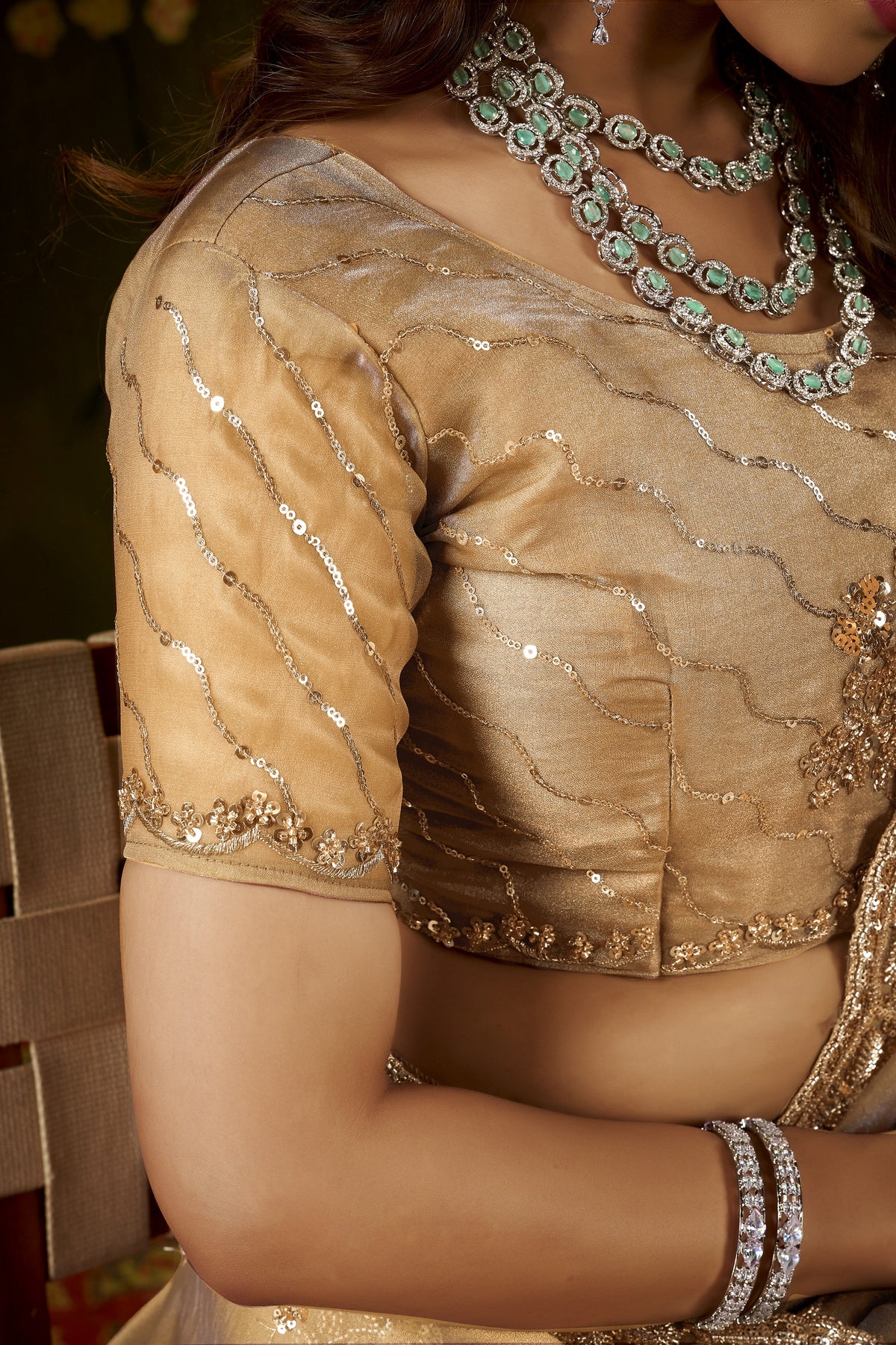 Matching designer blouse piece for the Handcrafted Champagne Gold Regal Bloom Soft Tissue Saree.