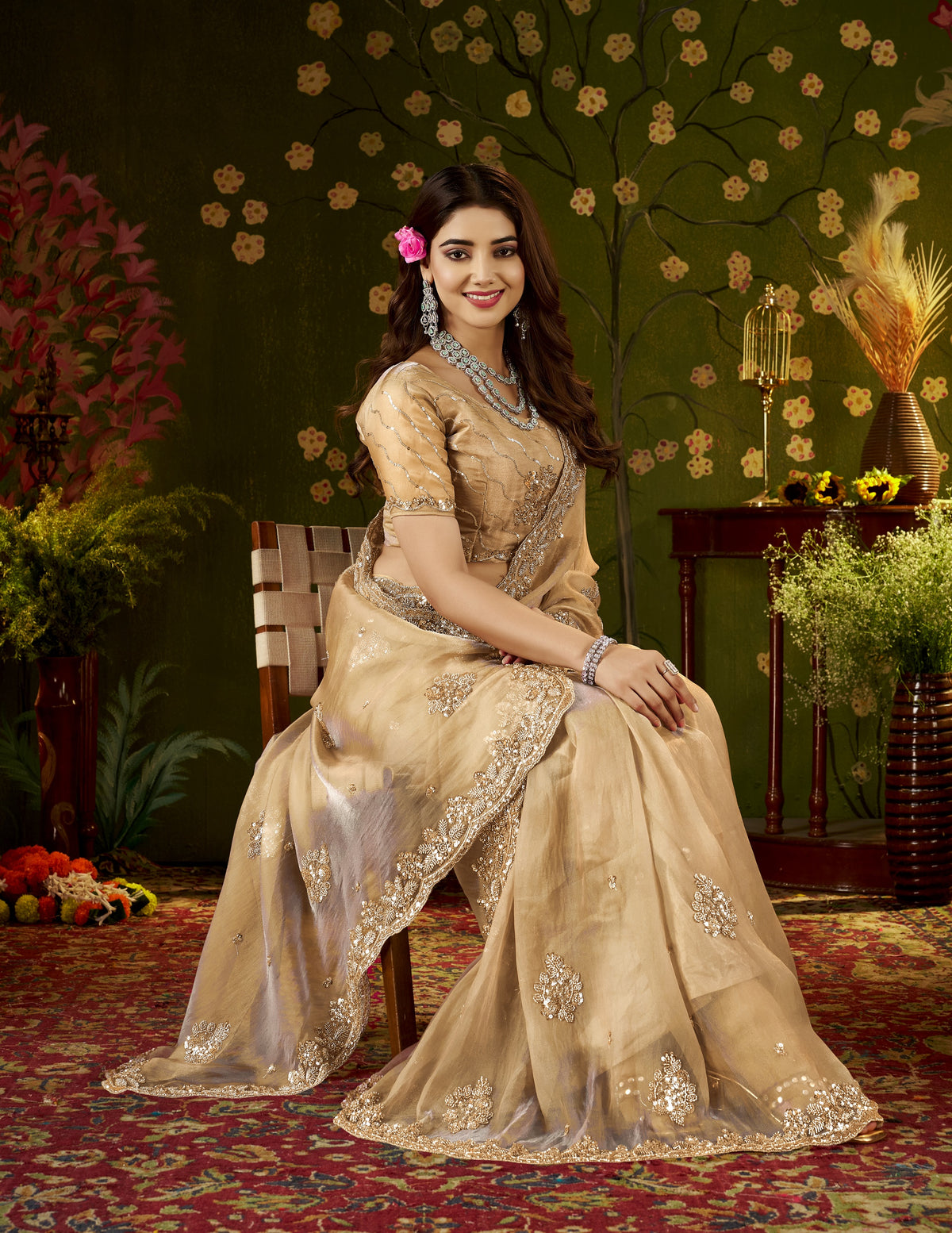 elegant look of the handcrafted champagne gold regal bloom soft tissue saree.