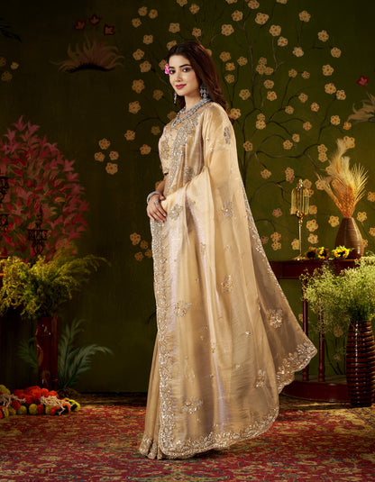 Detailed handcrafted embroidery on the Champagne Gold Regal Bloom Soft Tissue Saree.