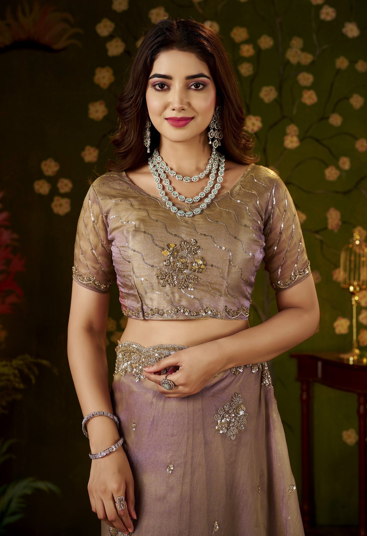 intricate handcrafted blouse detail of desert rose regal bloom soft tissue saree.