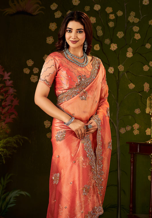 Elegant half view of Handcrafted Peach Coral Regal Bloom Soft Tissue Saree.