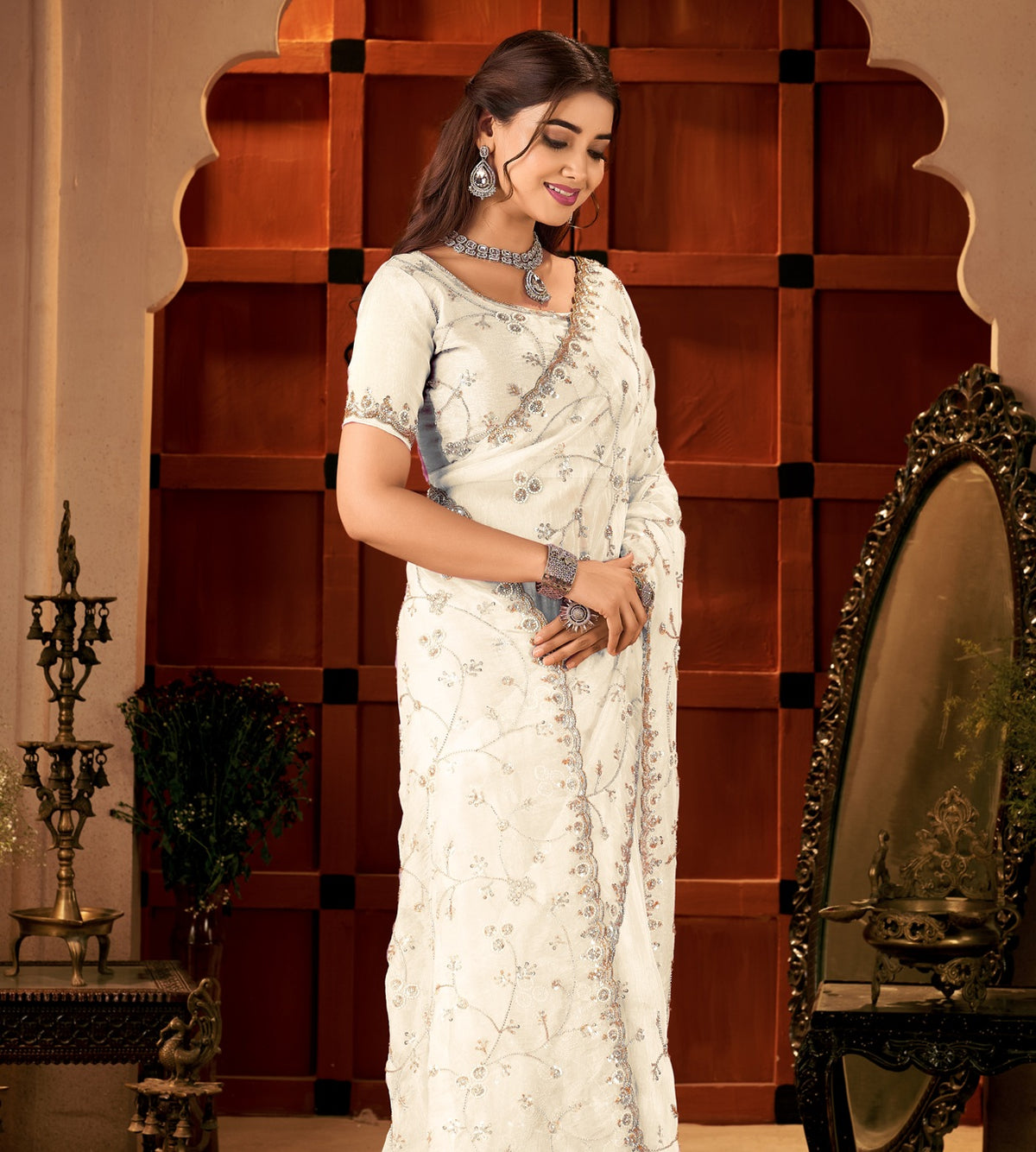 Chhoga Ivory White Tissue Silk Saree side profile highlighting graceful drape