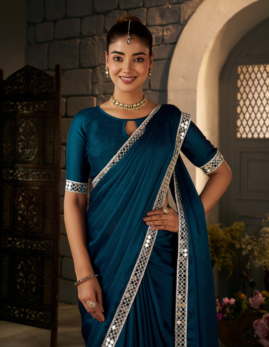 Half view of Peacock Blue Ethnic Saree with Silver Mirror Work