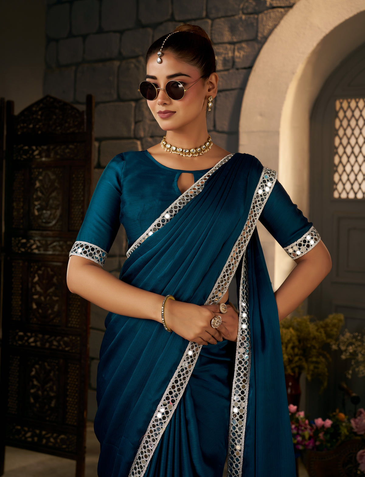 stylish look in peacock blue ethnic saree with silver mirror work by chhoga