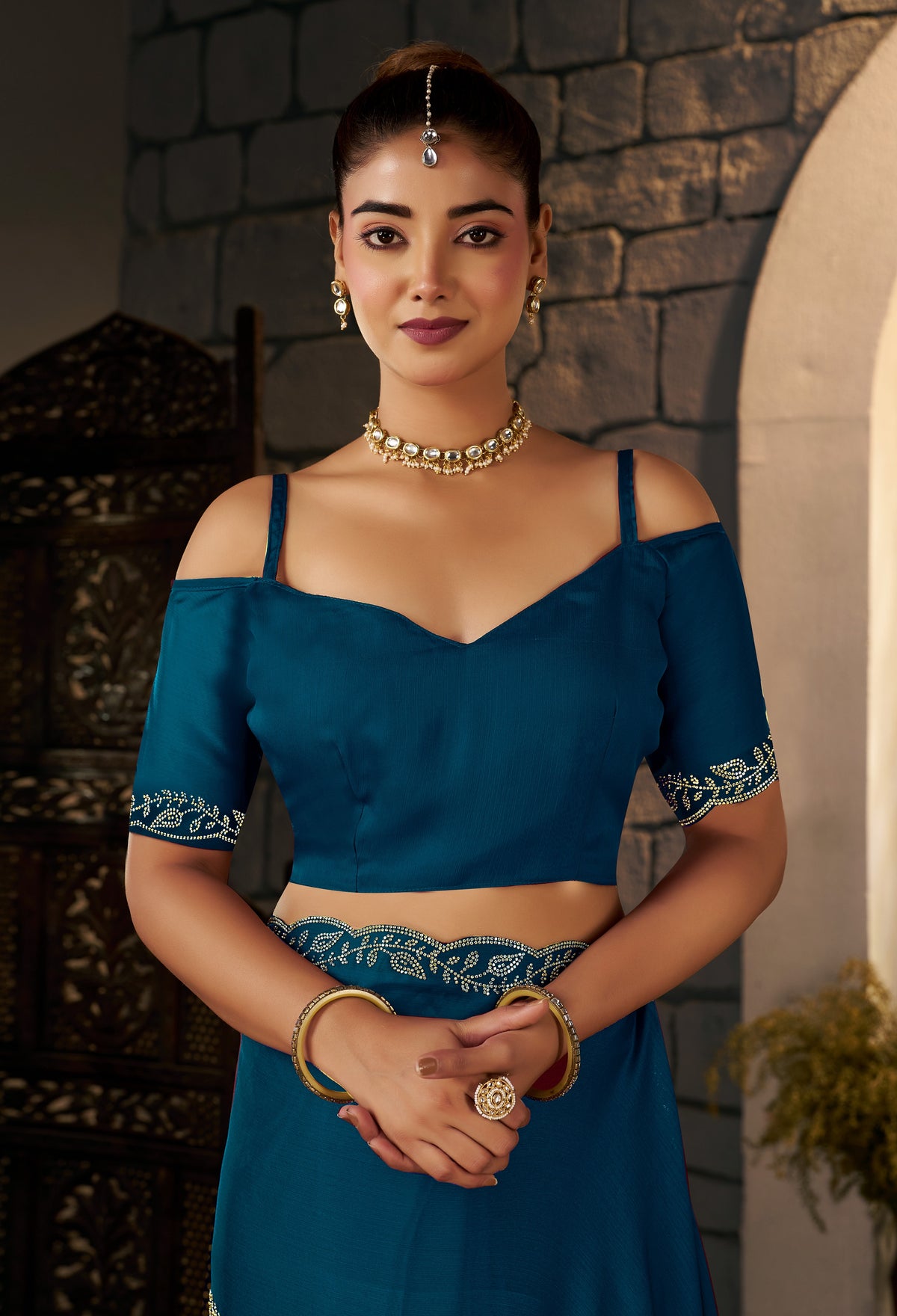 Matching blouse front for the Peacock Blue Gold Stonework Designer Saree.