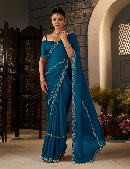 Full-length view of the Peacock Blue Gold Stonework Designer Saree with matching blouse piece.