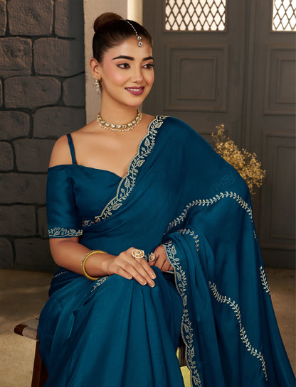 Wedding look featuring the Peacock Blue Gold Stonework Designer Saree by Chhoga.