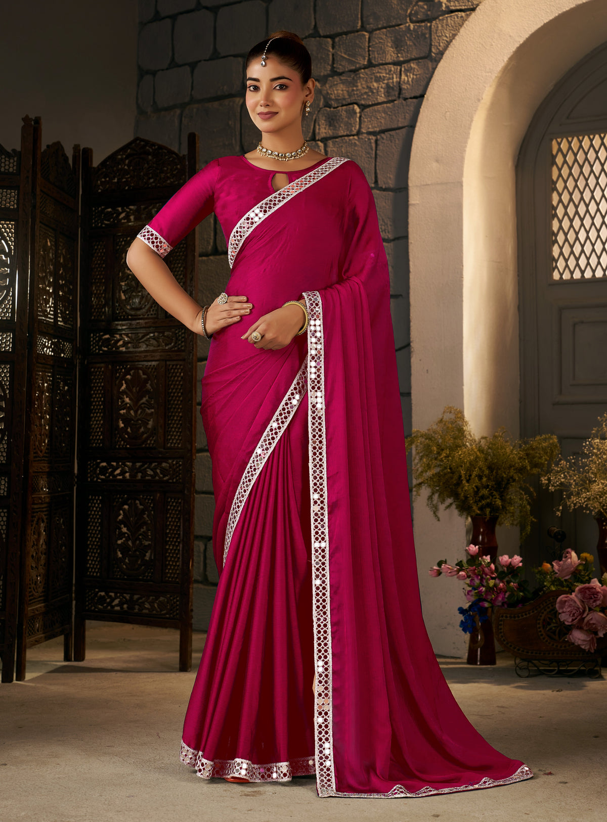 full view of pink ethnic saree with silver mirror work