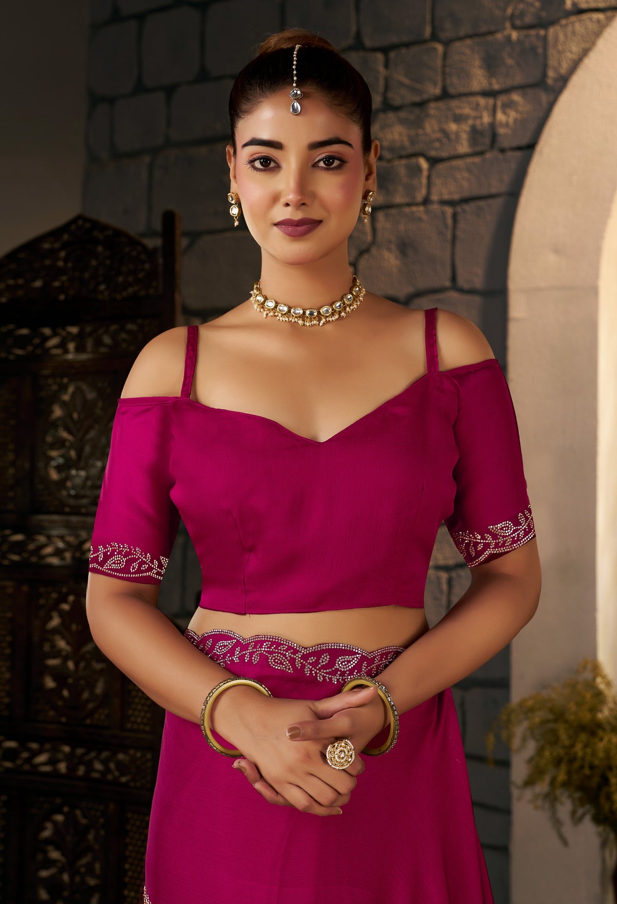 Matching blouse front with gold stonework for the Pink Designer Saree.