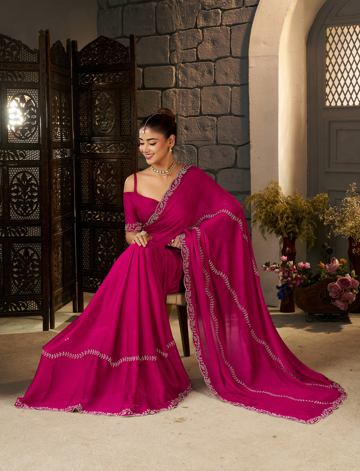 Pink Gold Stonework Designer Saree styled for festive celebrations and traditional occasions.