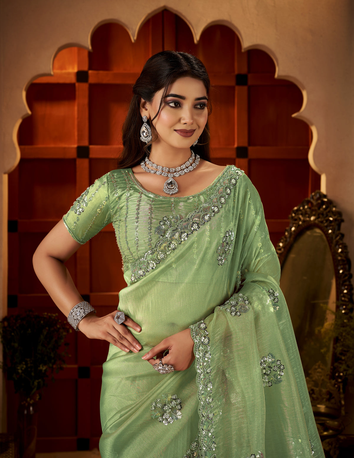 Chhoga Pistachio Green Floral Motif Saree with delicate floral hand embellishments