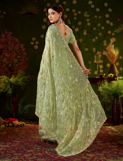Detailed pallu of Chhoga Pistachio Green Tissue Silk Saree with floral vine hand work and bead embellishments