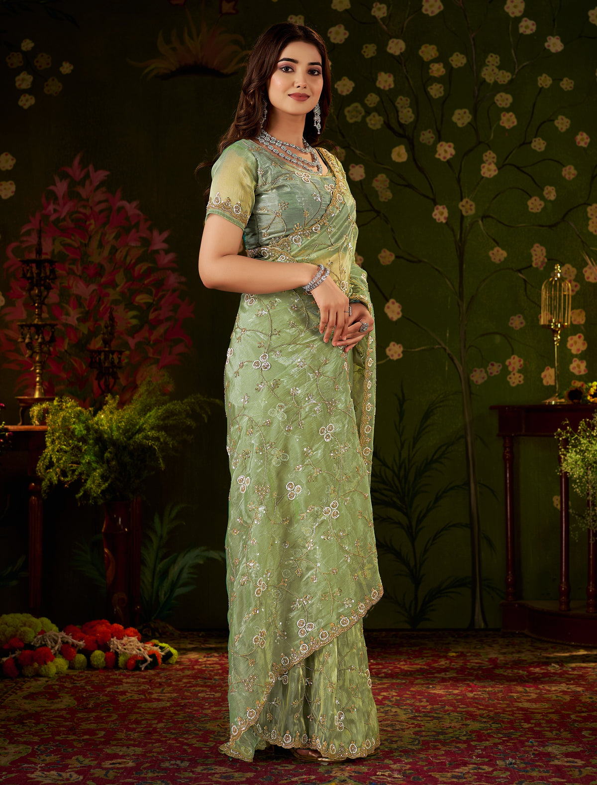 Chhoga Pistachio Green designer tissue silk saree with floral vine embellishments