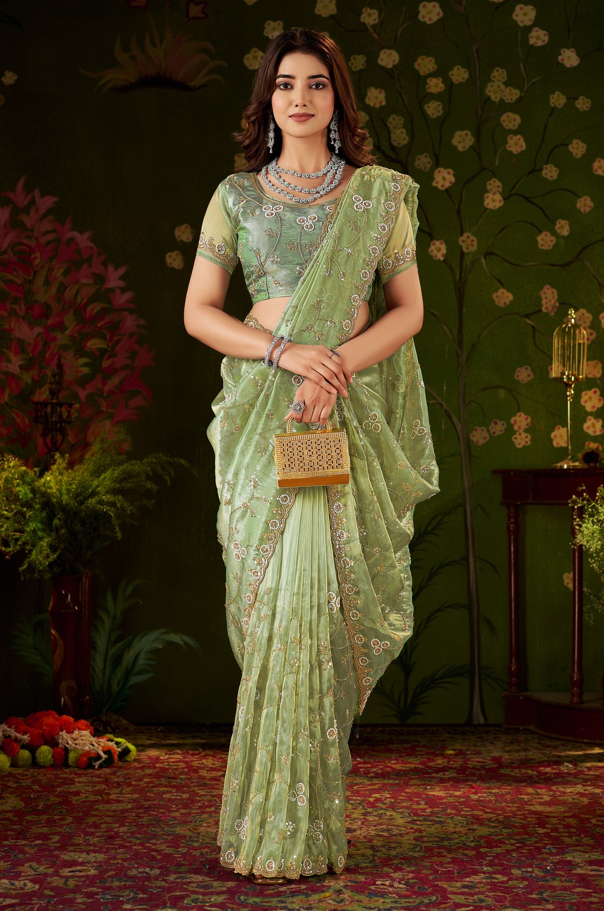 full view of chhoga pistachio green floral vine tissue silk saree with hand work