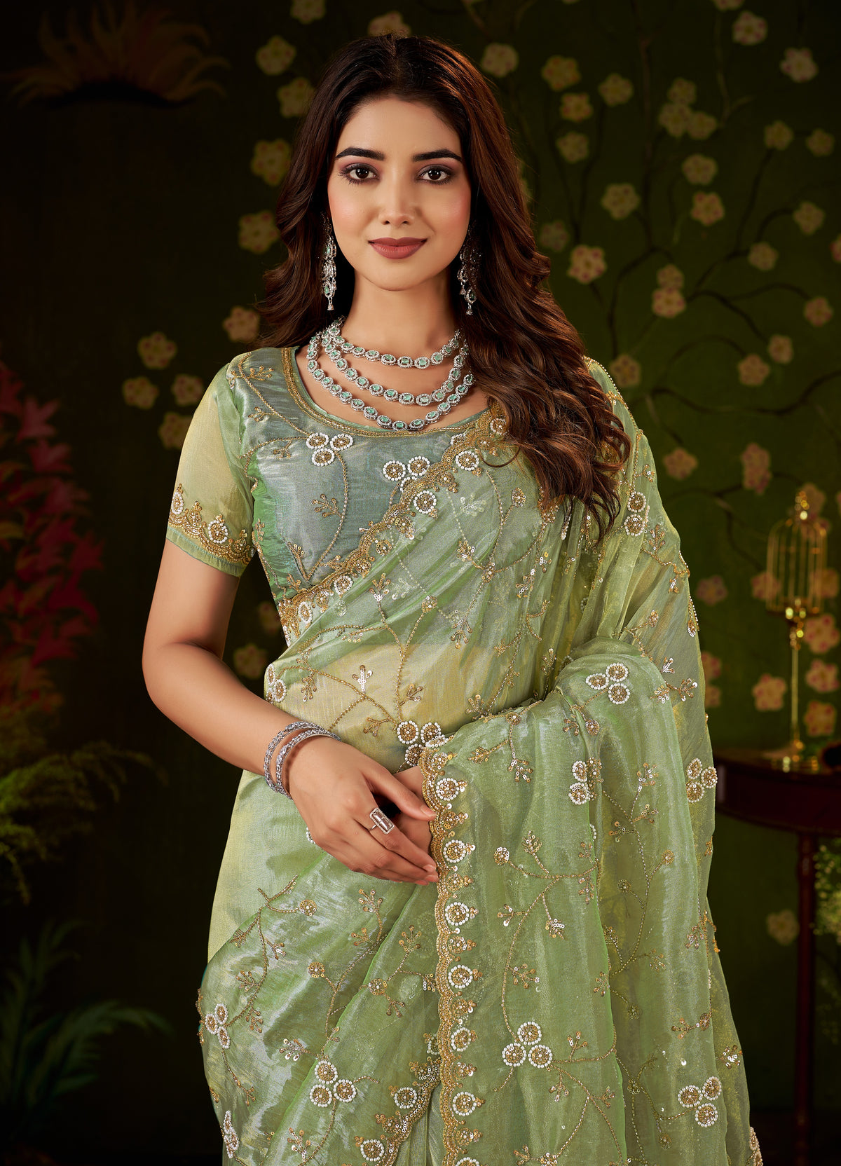 Chhoga Pistachio Green hand work tissue silk saree in elegant half view