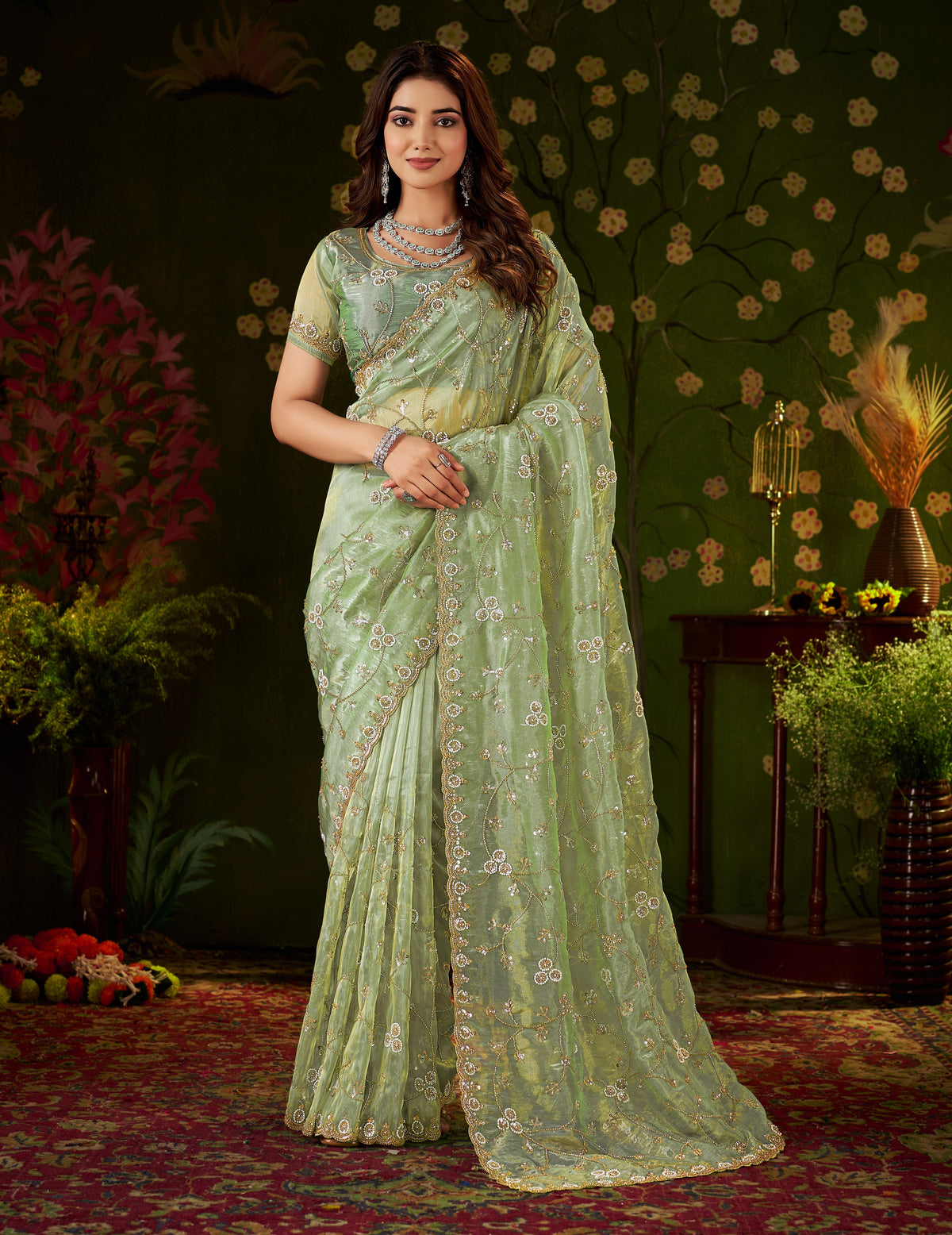 Full front view of Pistachio Green Tissue Silk Saree with elegant hand work by Chhoga