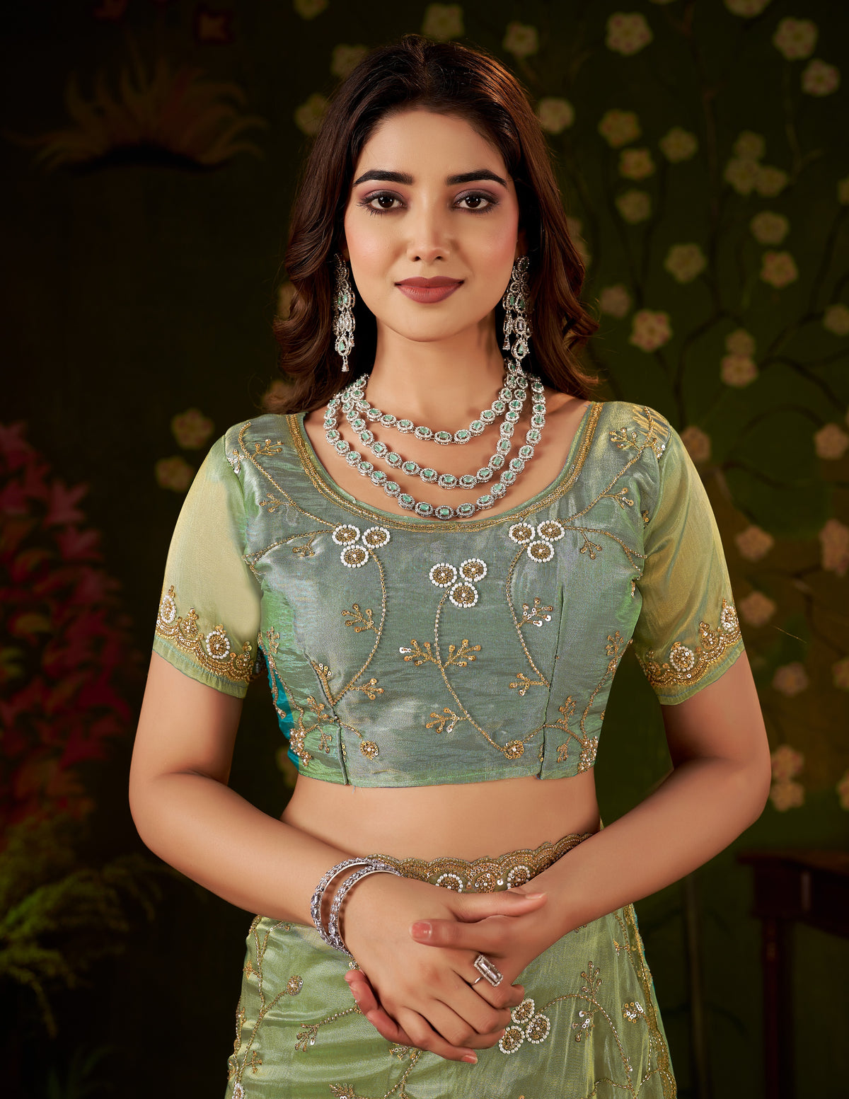 Matching unstitched Pistachio Green Tissue Silk blouse piece included with Chhoga saree