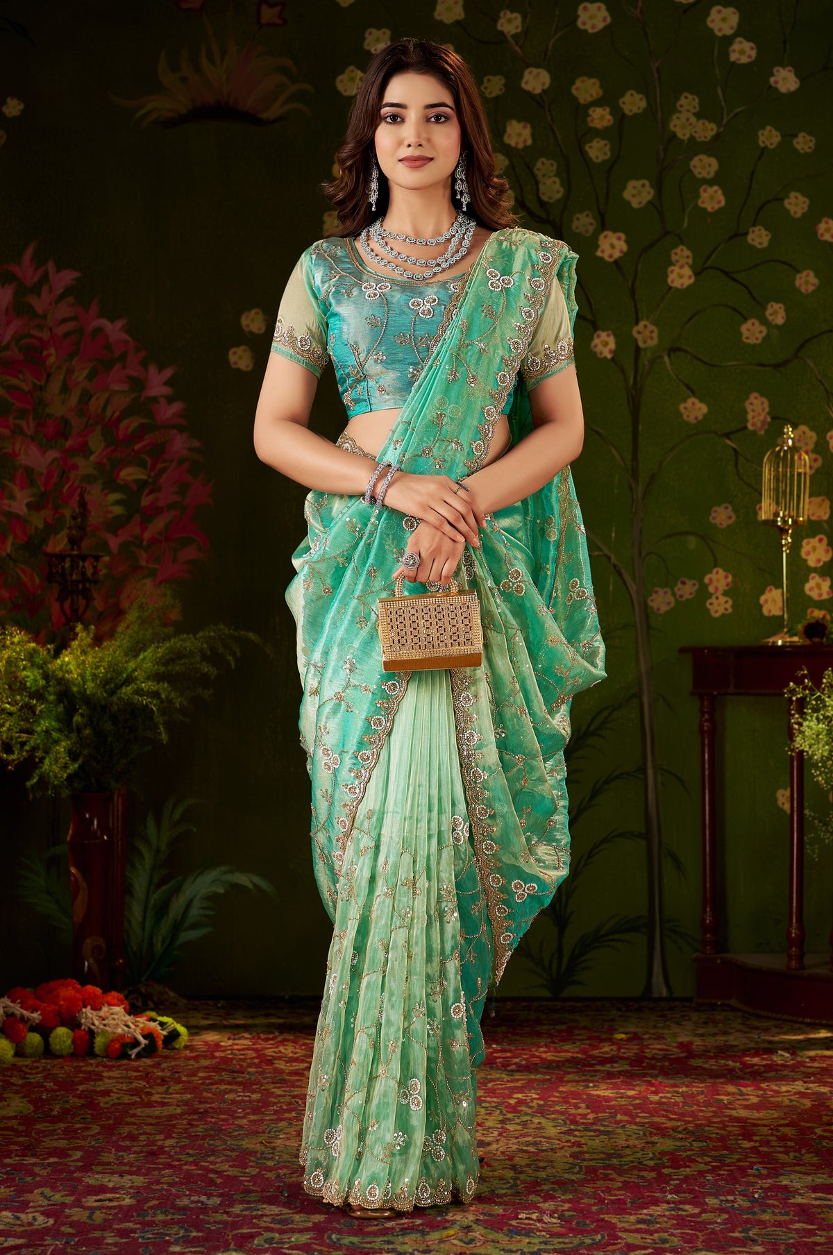 Chhoga Sea Green designer tissue silk saree with floral vine embellishments