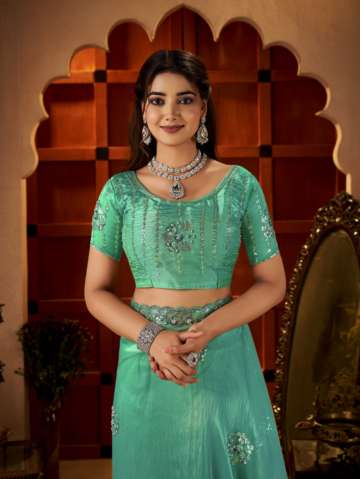 chhoga sea green blouse with matching hand embellishments