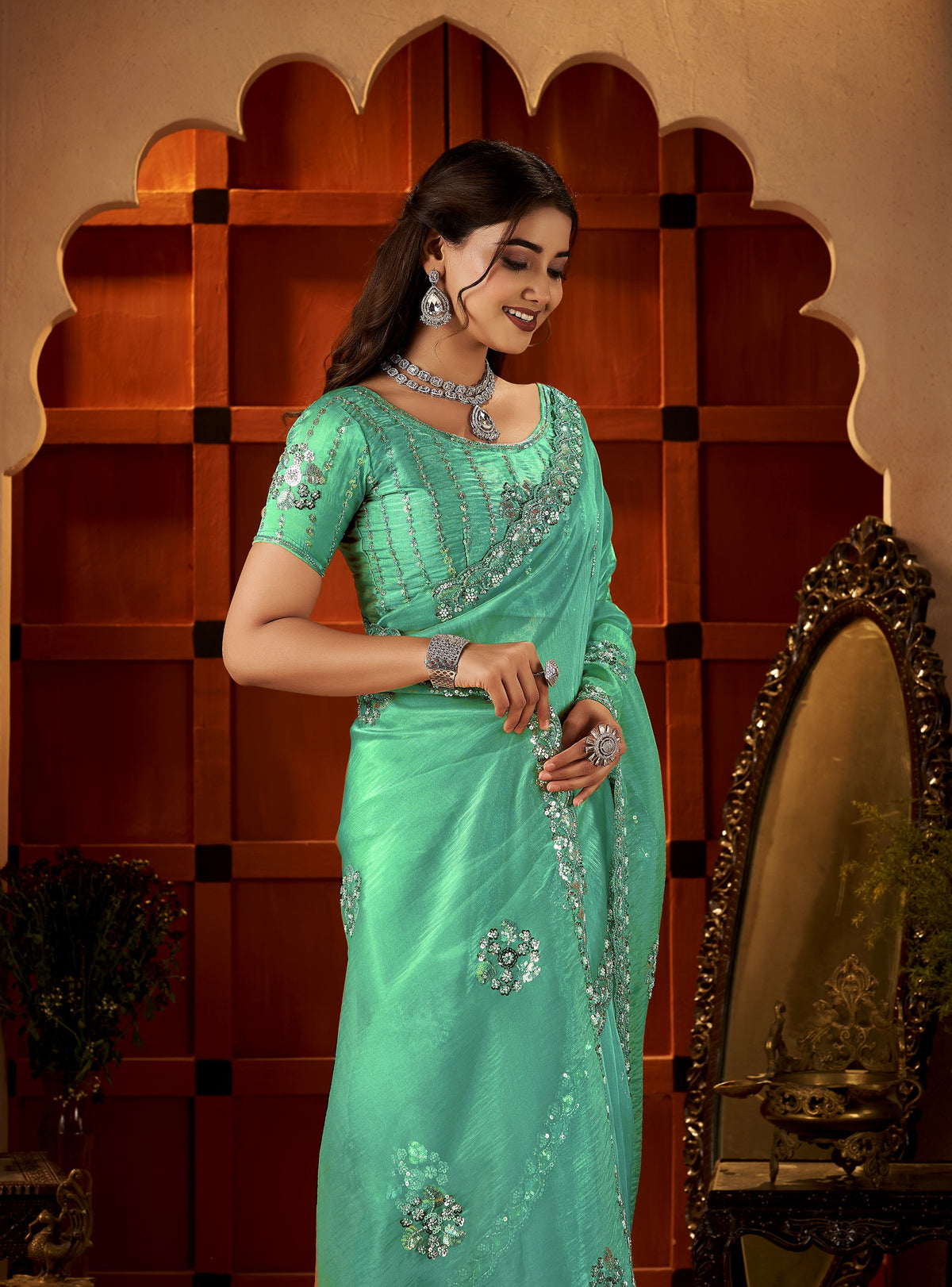 chhoga sea green floral motif saree scalloped border with intricate bead work