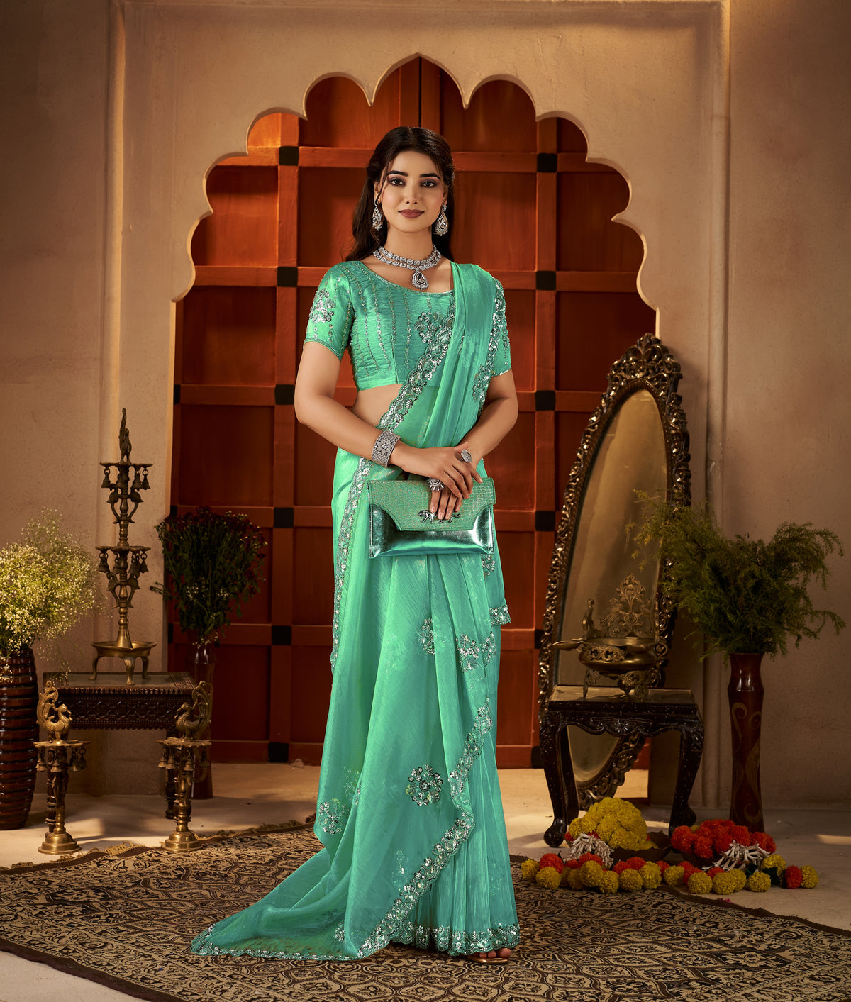chhoga sea green floral motif saree front view with elegant hand embellishments