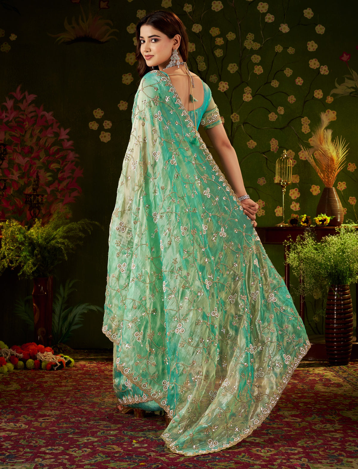 Detailed pallu of Chhoga Sea Green Floral Vine Tissue Silk Saree with hand work and bead embellishments